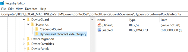 Screenshot of registry editor showing modified registry key to disable HVCI