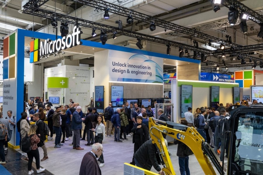 A group of people in the design and engineering section of the Microsoft booth at Hannover Messe