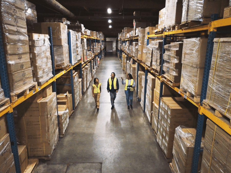 A group of women in a warehouse
