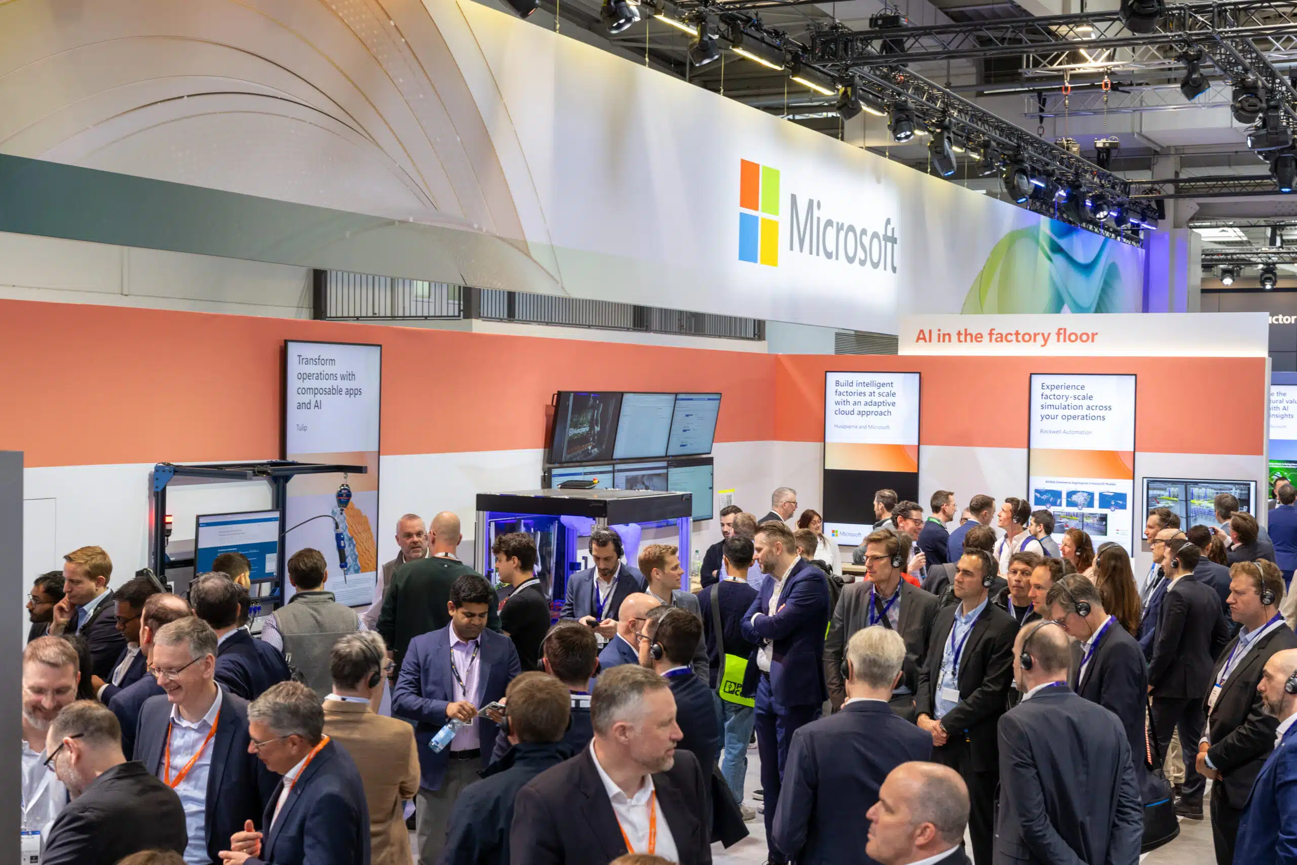 Hannover attendees tour the Microsoft "AI in the factory floor" neighborhood.